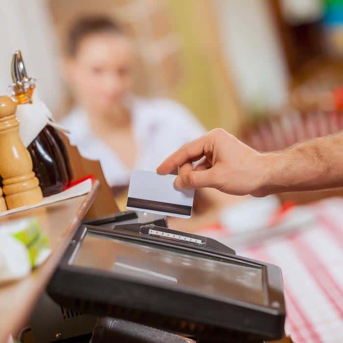 Business Loans for Restaurants - Small restaurant businesss taking card payment